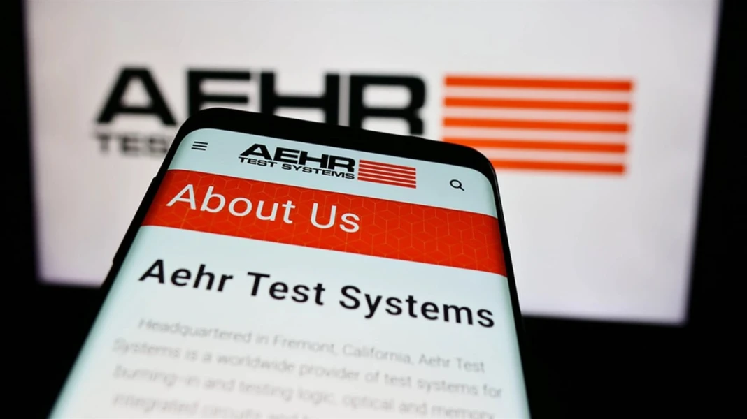 Stuttgart, Germany - 04-28-2024: Mobile phone with website of US semiconductor testing company Aehr Test Systems in front of business logo. Focus on top-left of phone display. — Stock Editorial Photography